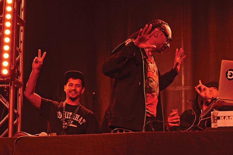 Steven Meland on stage with Snoop Dogg